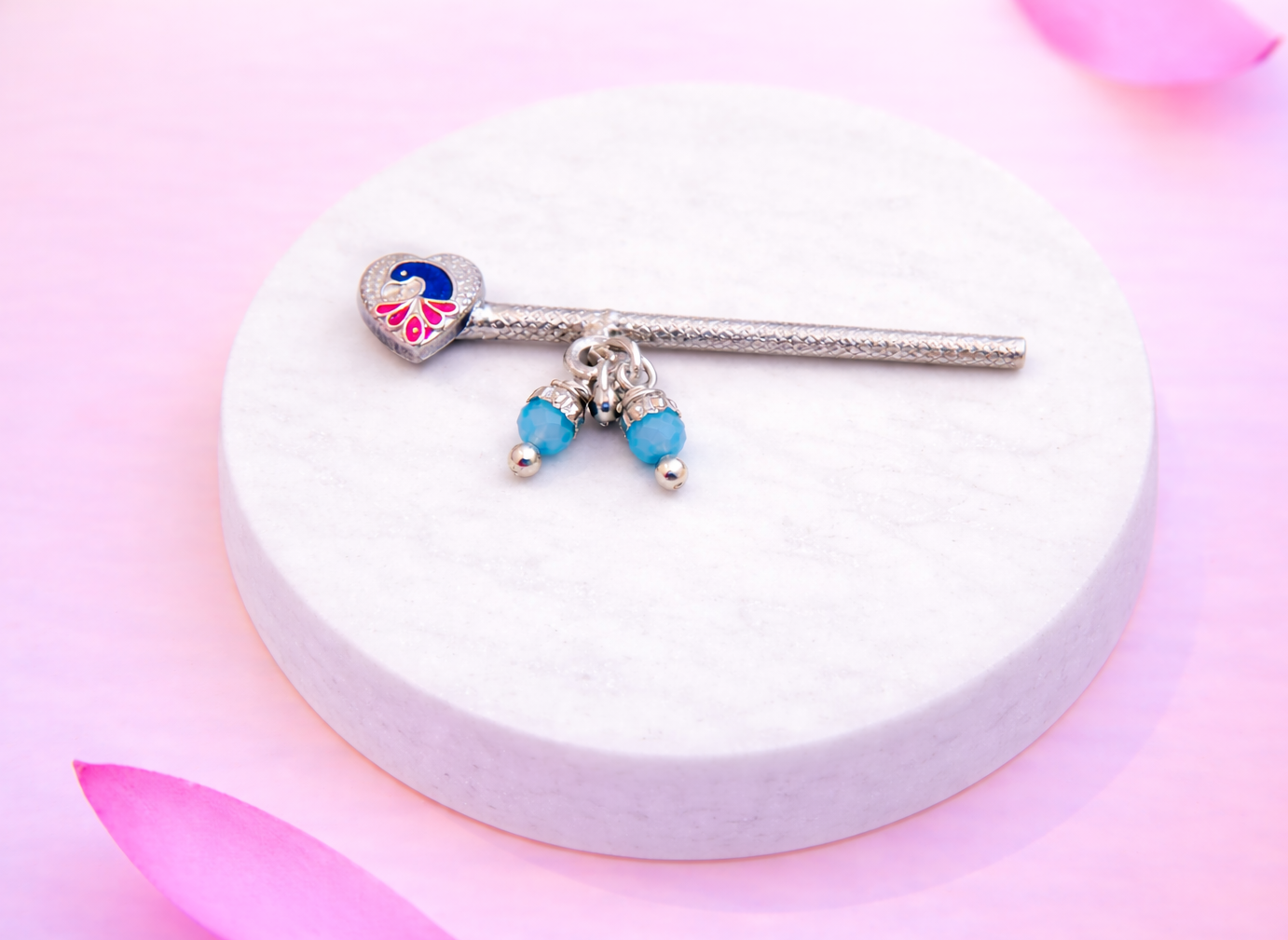 Elegant silver flute with peacock and blue beads